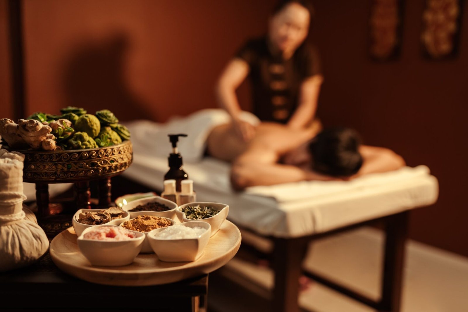 Traditional Thai spa treatment with herbal compresses and natural ingredients